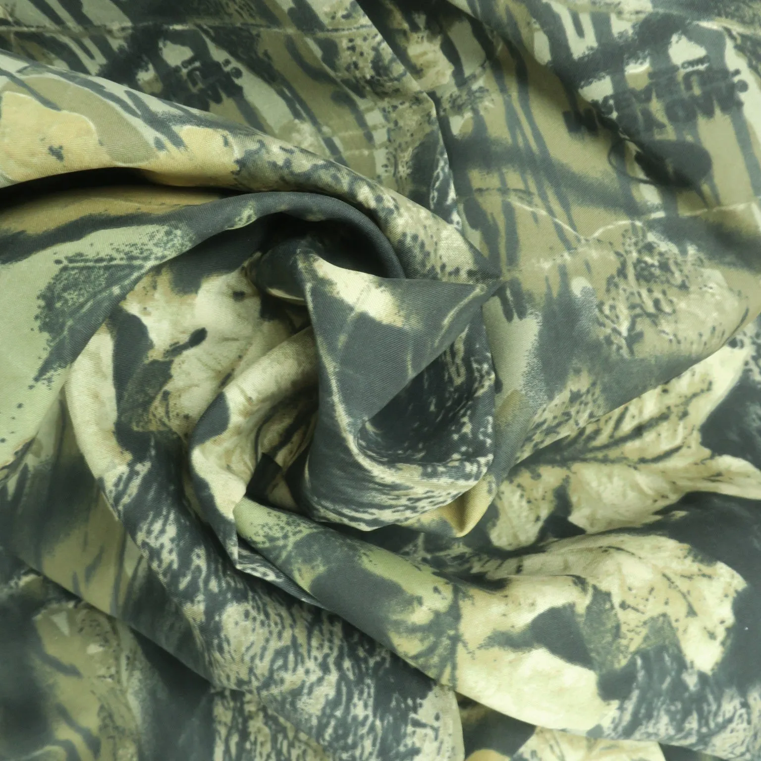 Olive Green Leaves on a Green Background Printed Cotton